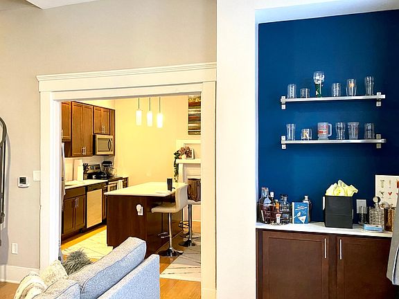 Enter into the Living Room. Open access to Kitchen for easy flow. Ceiling fans in both rooms.