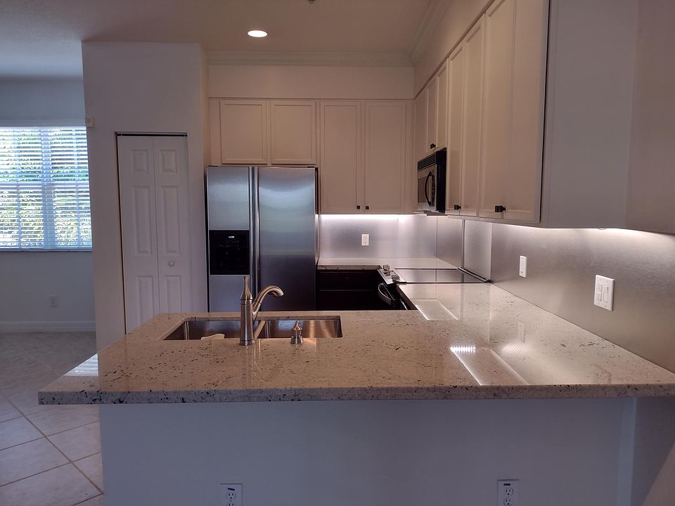 new cabinets and marble counter top