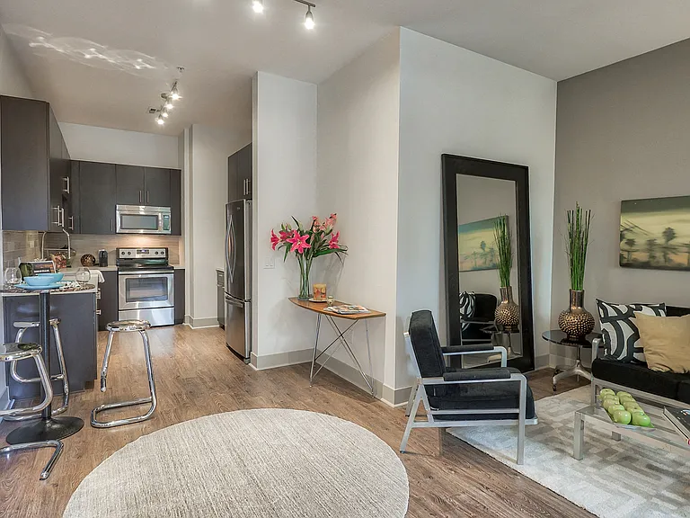 Wood style flooring in living and dining areas