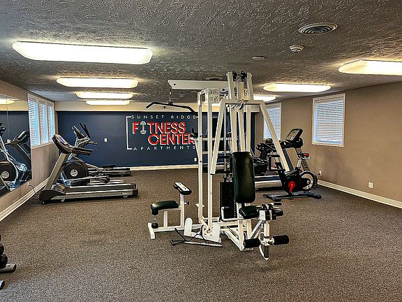 Fitness Center amenity for residents, open from 6:00am to 10:00pm