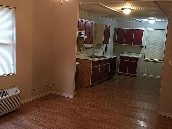 Den with kitchen view