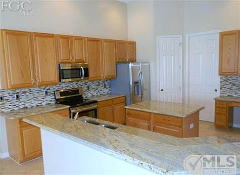 The Island Kitchen Has New Granite Countertops and New Stainless Steel Appliances, Walk-In Pantry An
