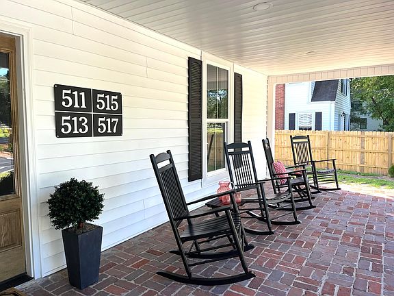 Rocking chair (shared) front porch overlooking Main Street.