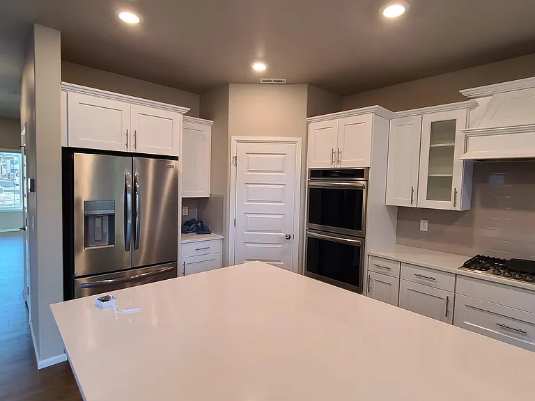 Kitchen with gas range and pantry