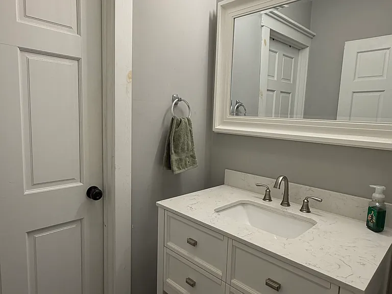 Bathroom Sink in entry way to bathroom separate from shower & toilet