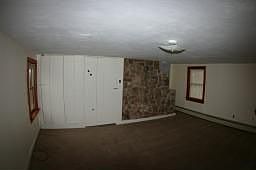 Exposed stone with walkup attic for possible loft