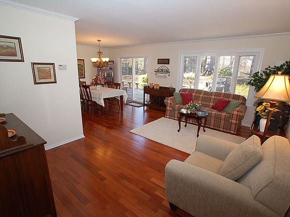 Formal Living Room with Lyptus Hardwood Flooring and bay window.
