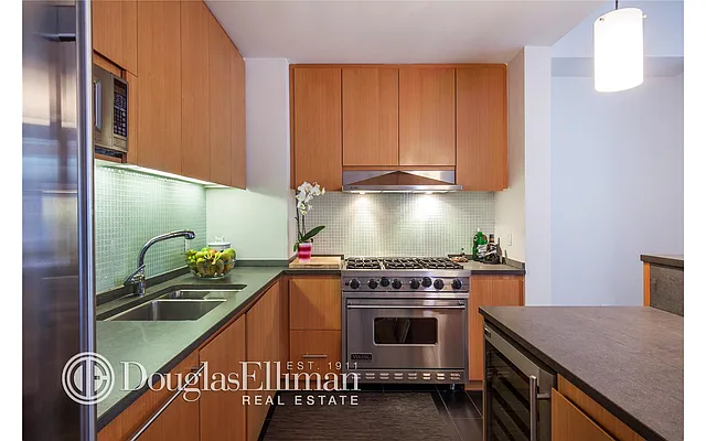 Sold by Douglas Elliman | media 18