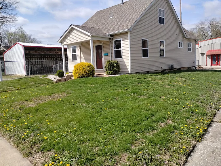 The side of the house.