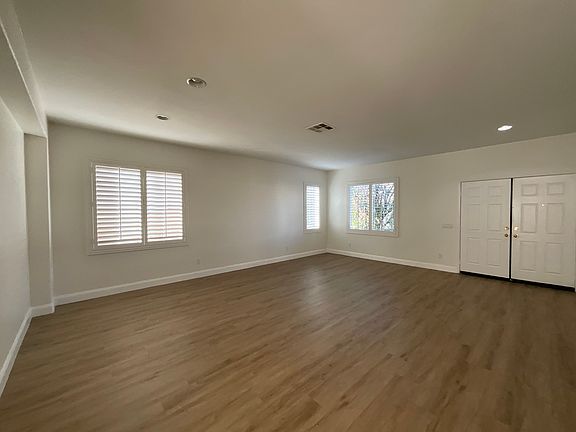 Front door entry to large living room