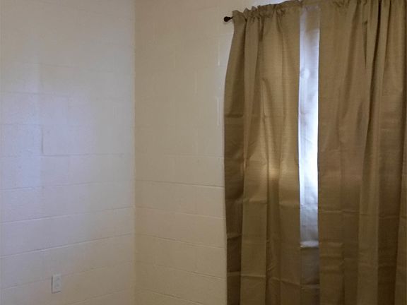 Bedroom 1 - Room darkening drapes and rod