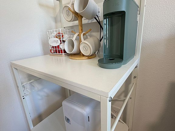 Start your morning right with included Keurig and mini fridge!