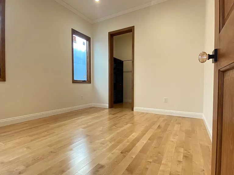 bedroom with walk-in closet