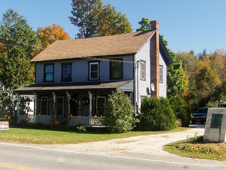 front of house with monument