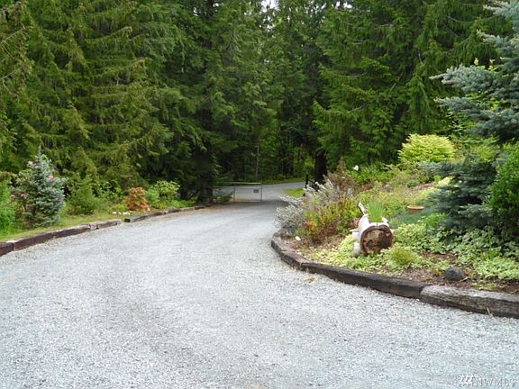 View back down the driveway to the private dead end road.