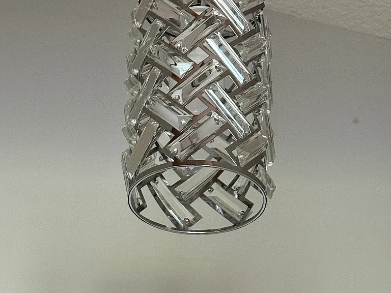 Close up view of beveled pendant light.