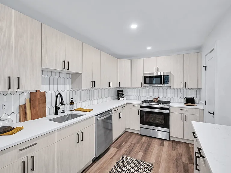Chef inpsired kitchens with custom built cabinetry and stainless steel appliances