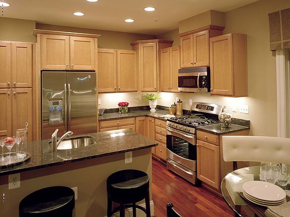 Photo of similar kitchen; actual home appointed with different finishes.