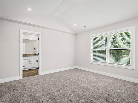 Unwind in the master bedroom after a long day