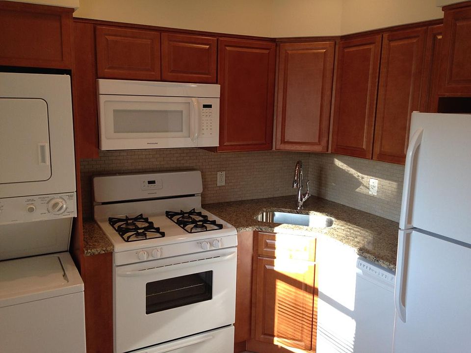 Renovated Kitchen w/ Granite Counters and Backsplash