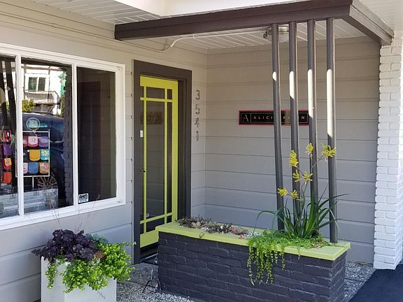 3541 Wilkinson Lane - this is our showroom. The cottage can easily revert back to a detached home.