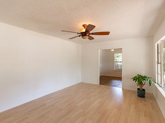 opposite view of front living area looking into dining room
