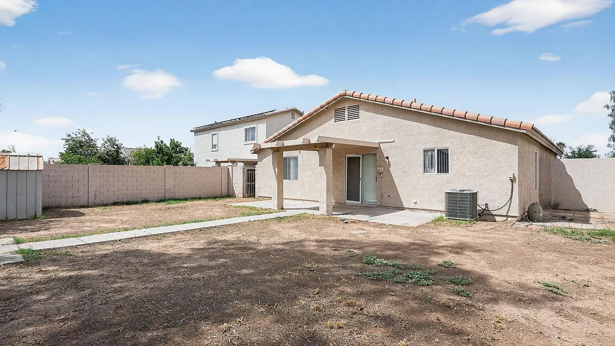 Building Photo - 7395 W San Miguel Ave