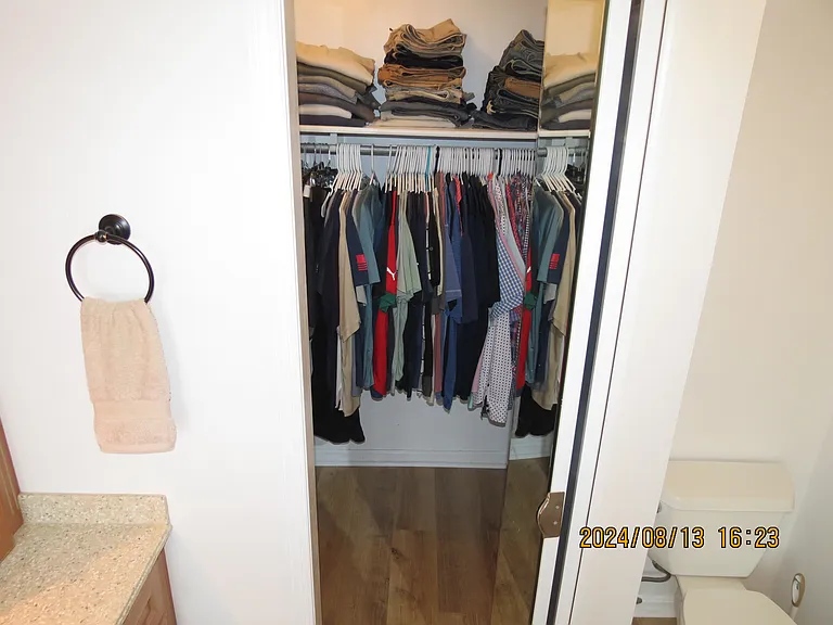 Walk-in Closet in Master Bedroom Bathroom