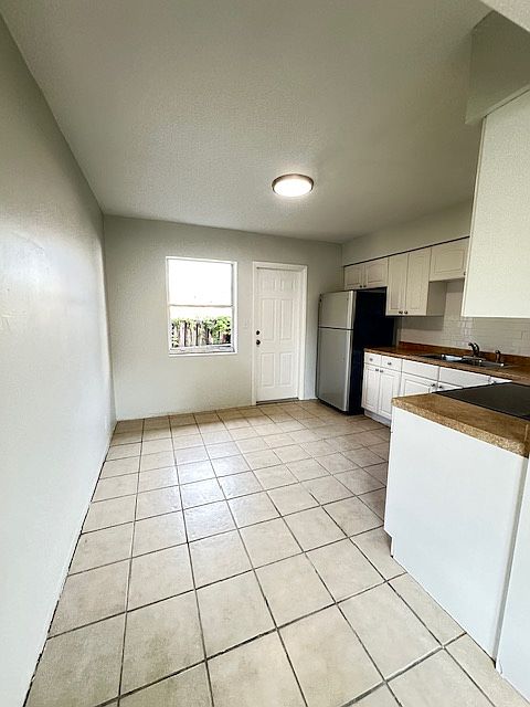 Enter Eat-in Kitchen from Living Room
