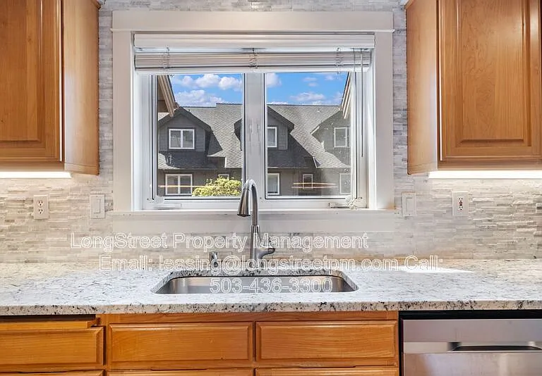 10247 NW Village Heights Dr — Photo 22