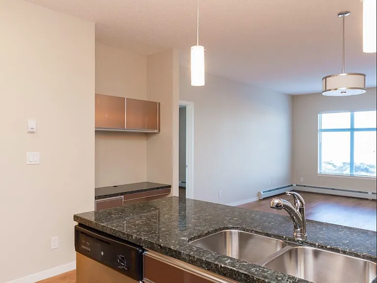 104 Mackenzie Way SW — Photo 10