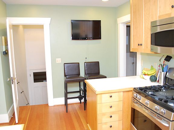Kitchen, stairs lead to bsmt