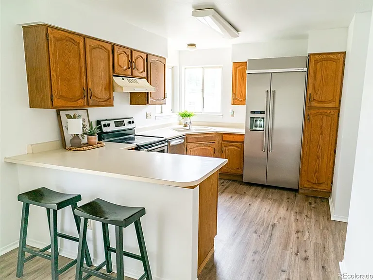 12812 E Wyoming Cir — Photo 4