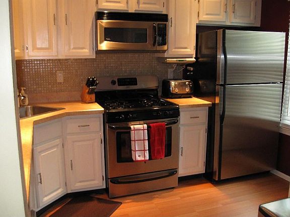 Updated Kitchen with Stainless Steel Recessed Lighting and More