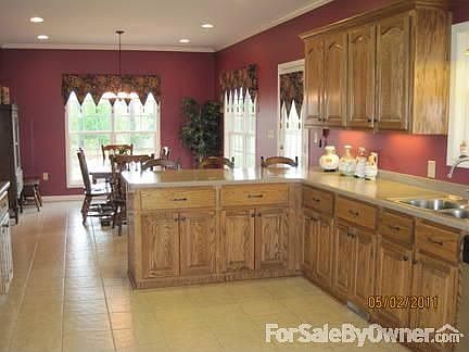 Kitchen-custom cabinets/ ceramic tile