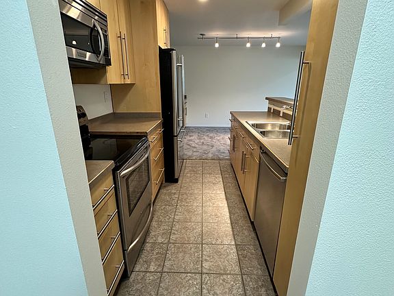View of kitchen from the front hallway.