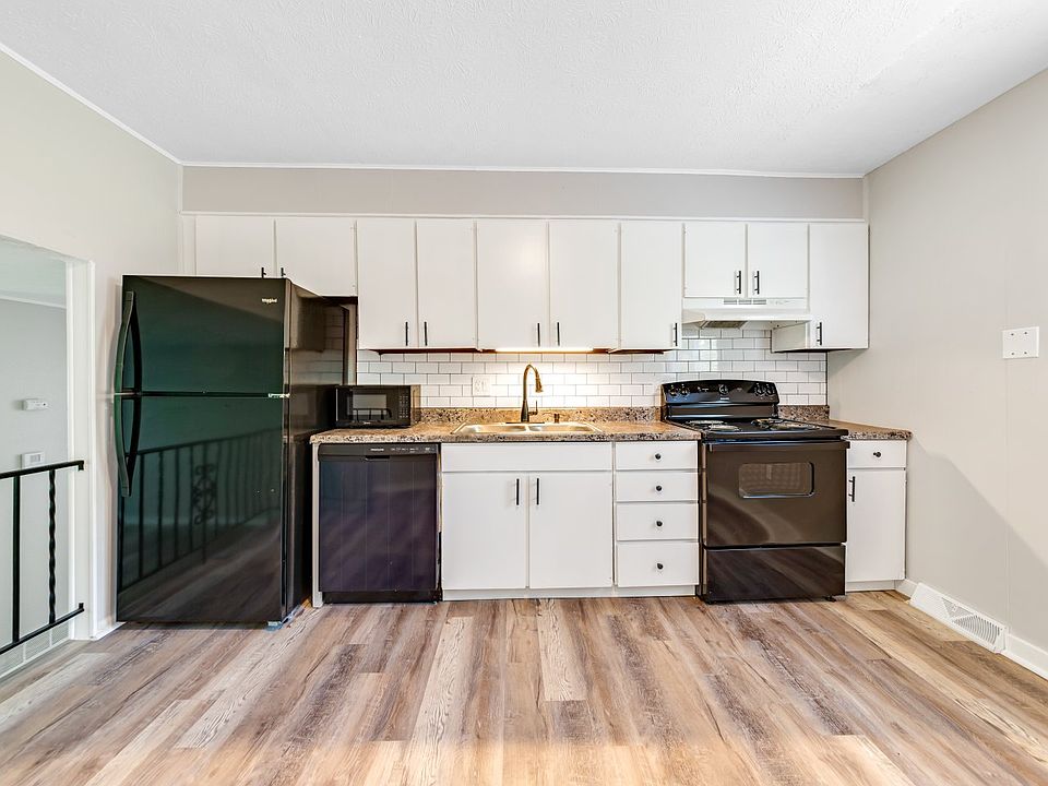 Fully loaded kitchen with brand new dishwasher, range, and refrigerator!