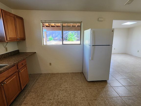 Kitchen & Livingroom Area w Brand New Refrigerator