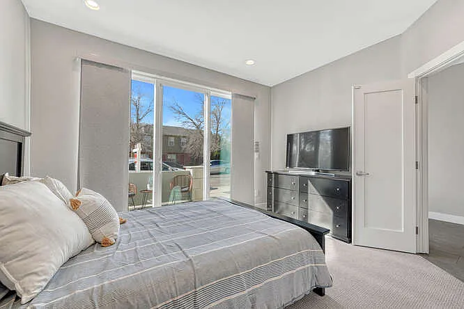 Bedroom with walkout patio, entry level