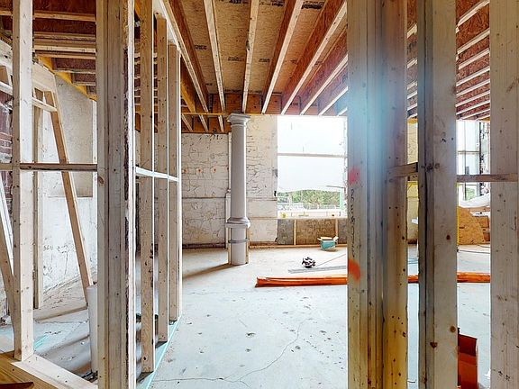 Light Filled Spaces with Soaring Ceilings and Original Architectural Details Throughout