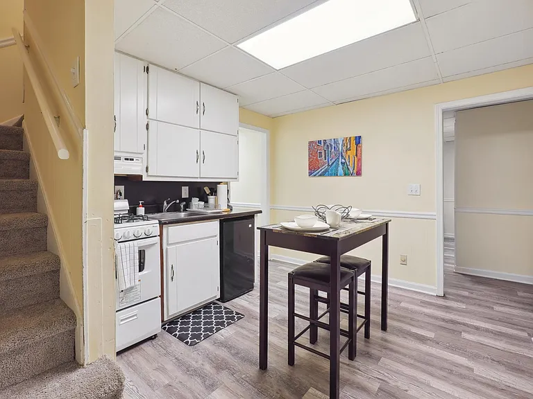 Small full Kitchen with Breakfast table -Basement Level
