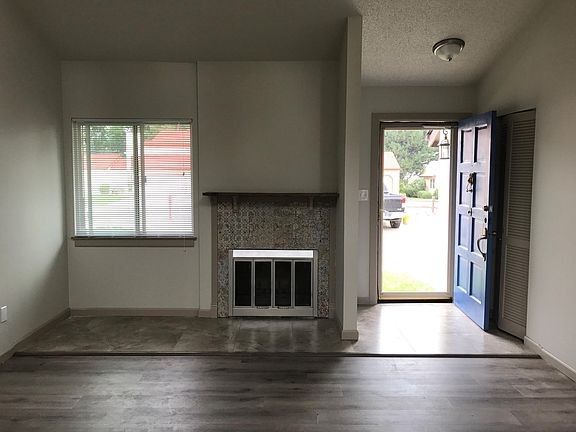 Front entrance, tile entryway, new windows, fireplace