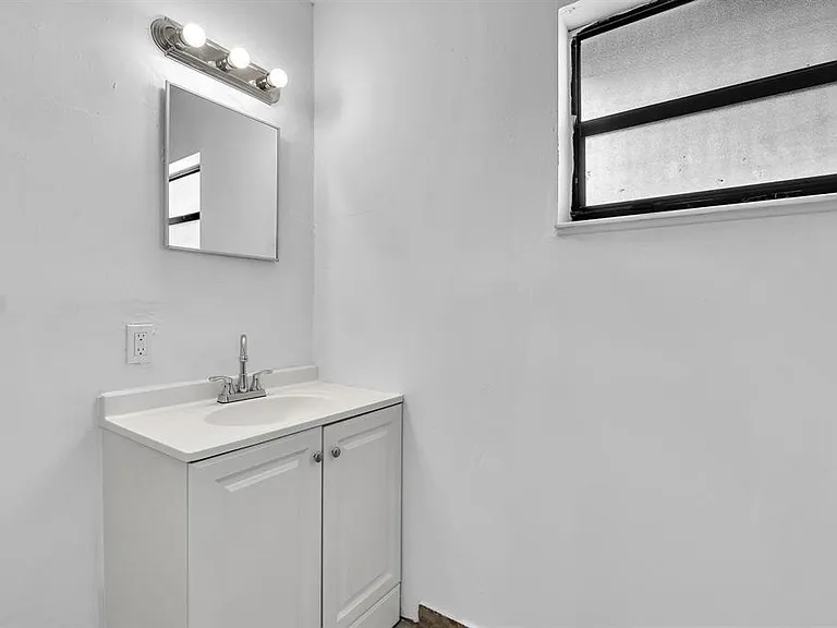 5748 NW 27th Ct — Photo 8