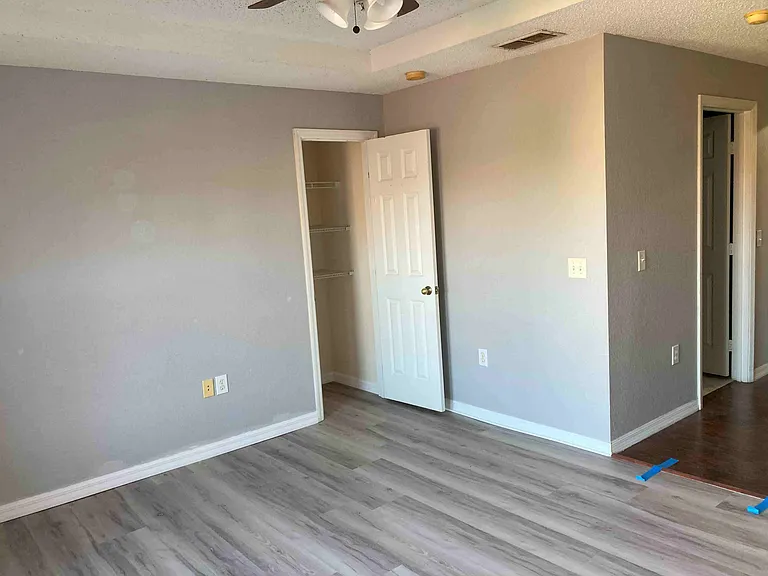 The master bedroom with new installed Vinyl plank floor