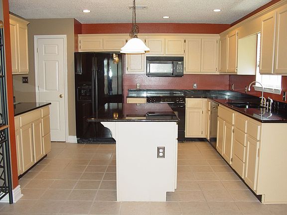 Upgraded Kitchen with New Granite Countertop and Center Island