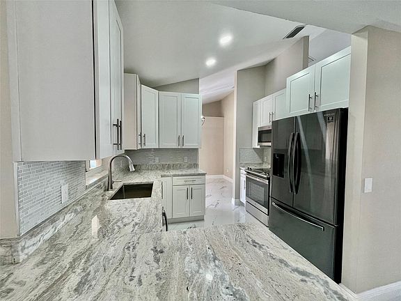 3rd image of 5437 NW Edgewater Avenue