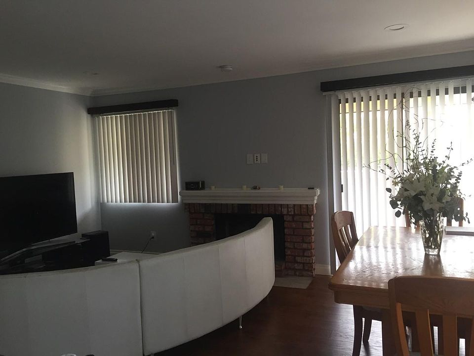 This home features a bright and open living and dining area with a spacious layout that flows effortlessly into the kitchen_creating the perfect space to bring family and friends together. Whether you're hosting a dinner, enjoying a quiet night in,