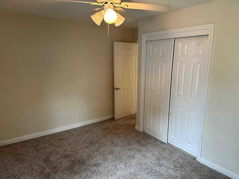front bedroom with closet view