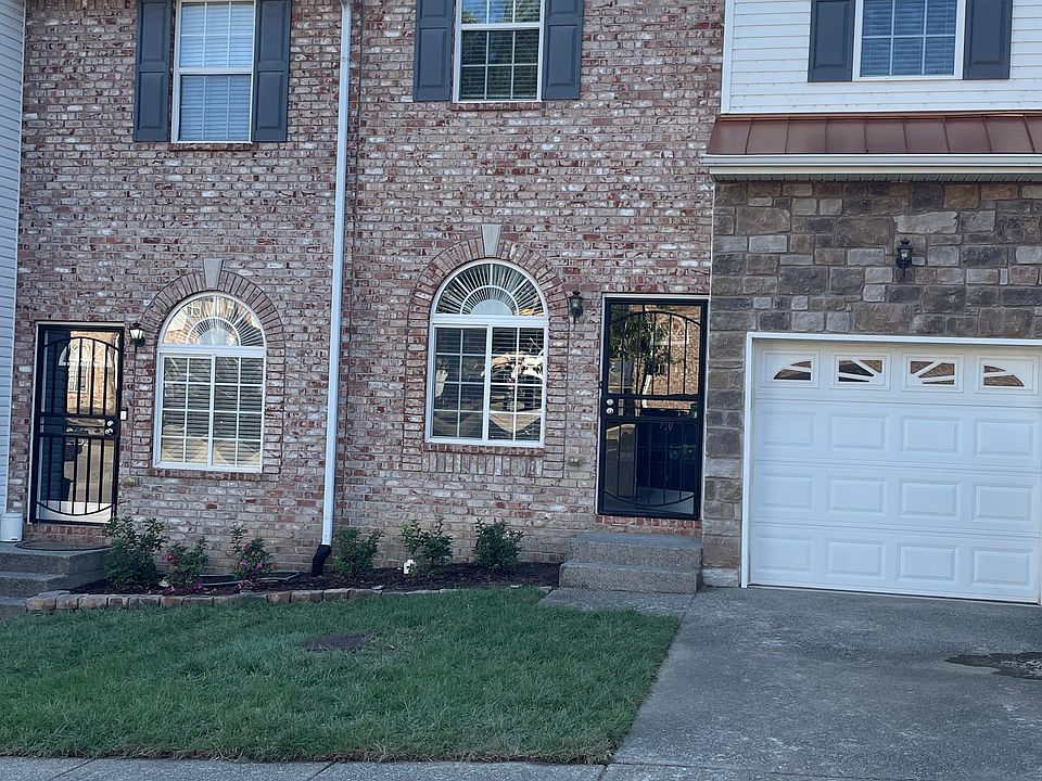 Front Yard with freshly laid sod, new landscaping and newly planted bushes