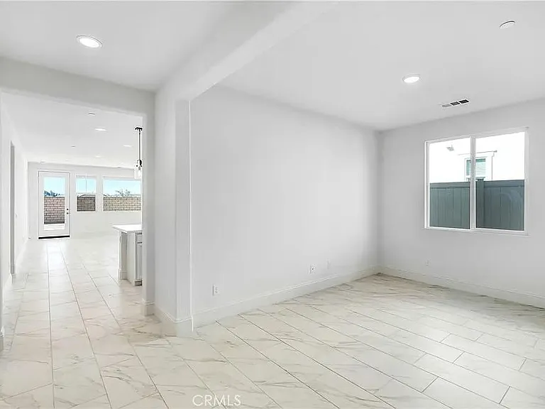 your own living room with a door installed to separate your living space from the shared space.